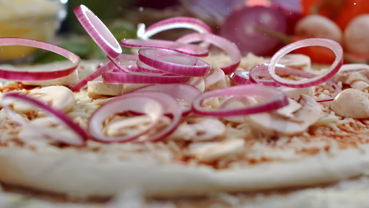 Pizza topping with red onion and mushrooms