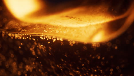 golden glowing particles in glass geometry, 3d rendering.
