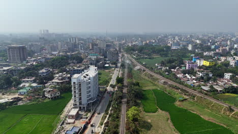 cinematic aerial drone shot of a large city in bangladesh