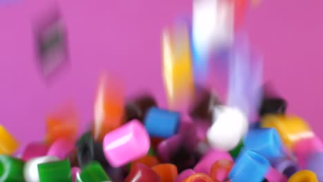 Colorful-background-of-multi-color-beads-raining-down