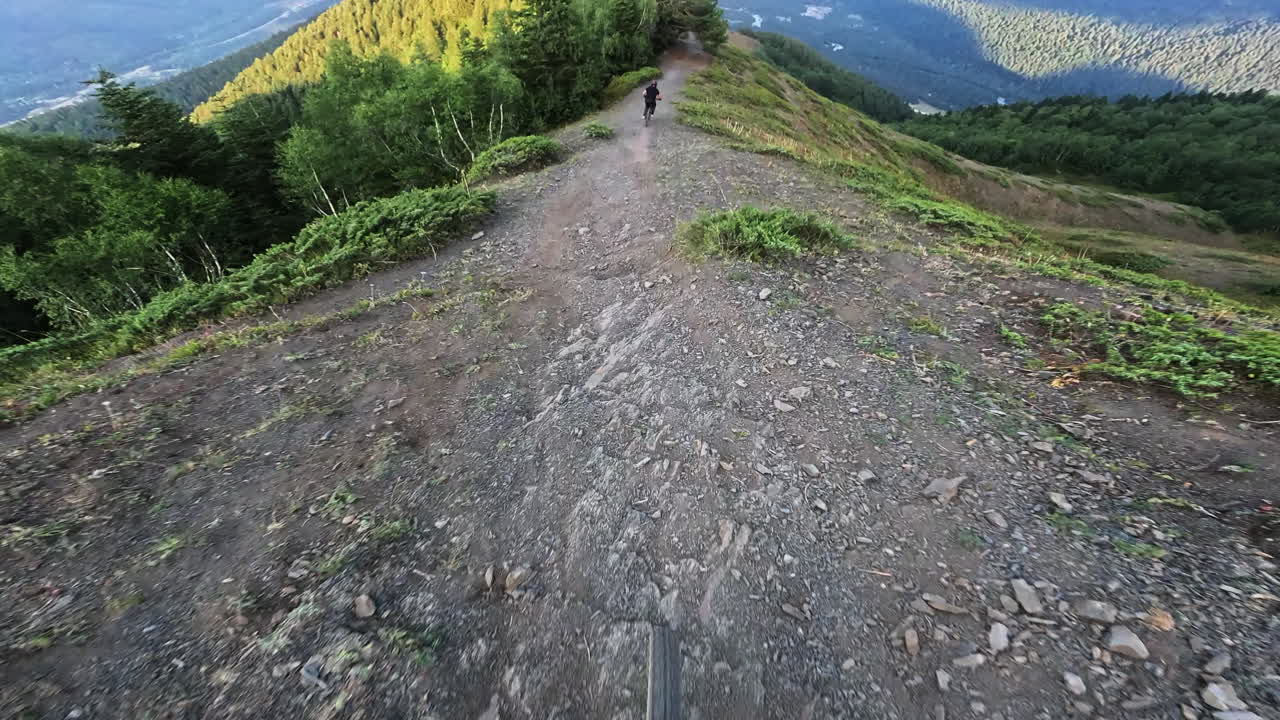 FPV Mountain Biking Down a Scenic Mountain Ridge Trail