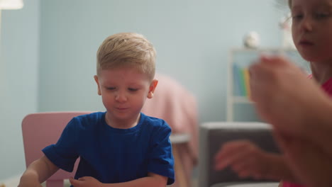 Boy-inserts-stick-into-soil-and-gets-disgusting-of-dirt