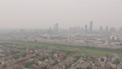 mississauga skyline covered in haze due to wildfire smoke, poor air quality in the area