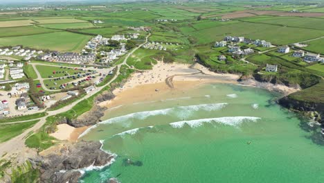 Treyarnon-Bay-with-Turquoise-Waters-and-Beautiful-Beach-Coastlin,-Scenic-Landscape-from-an-Aerial-Drone-in-Cornwall,-UK