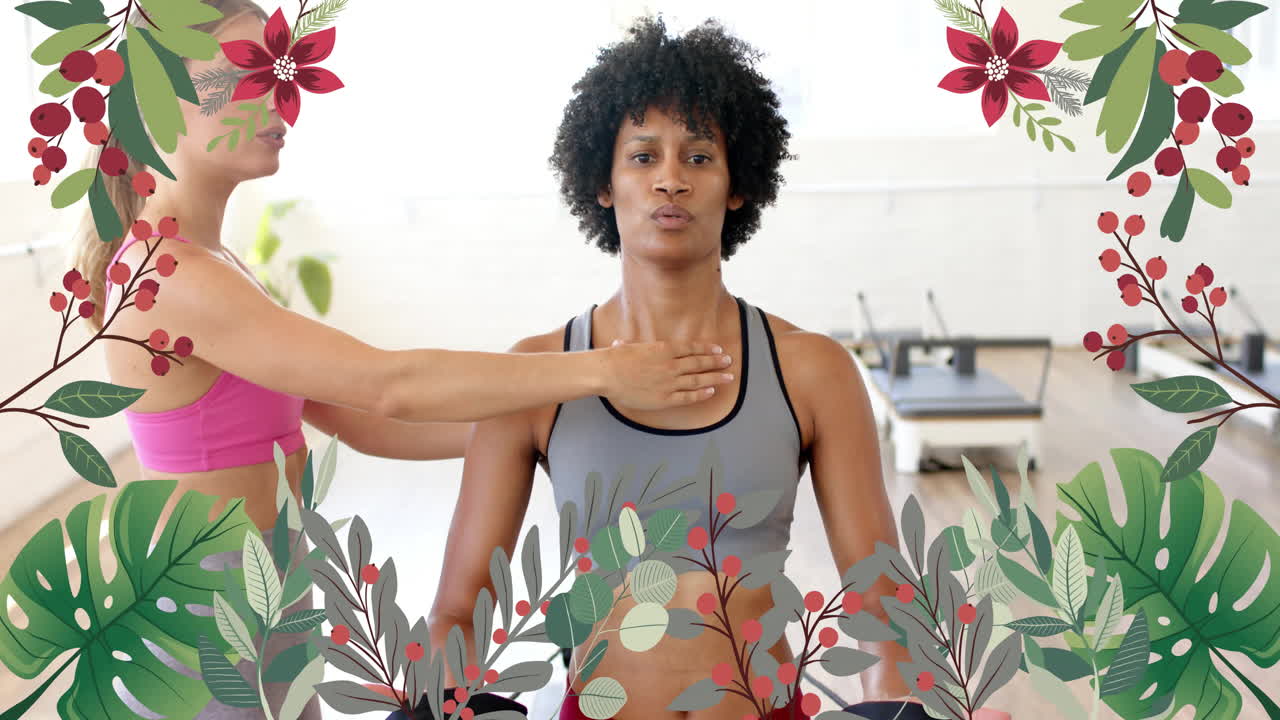 animación de frontera floral sobre mujeres practicando yoga en el estudio de fitness