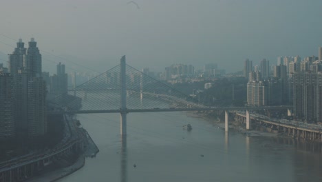 a cruise ship is running under the bridge