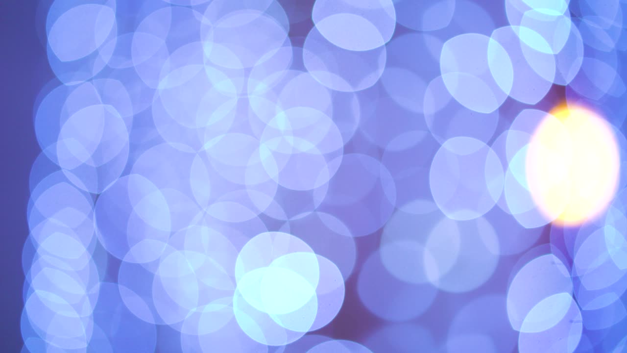 fondo de vacaciones de círculos azul claro bokeh