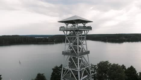 aerial shot of wdzydzki park krajobrazowy in kaszuby, poland with view of observation tower in wdzydze kiszewskie