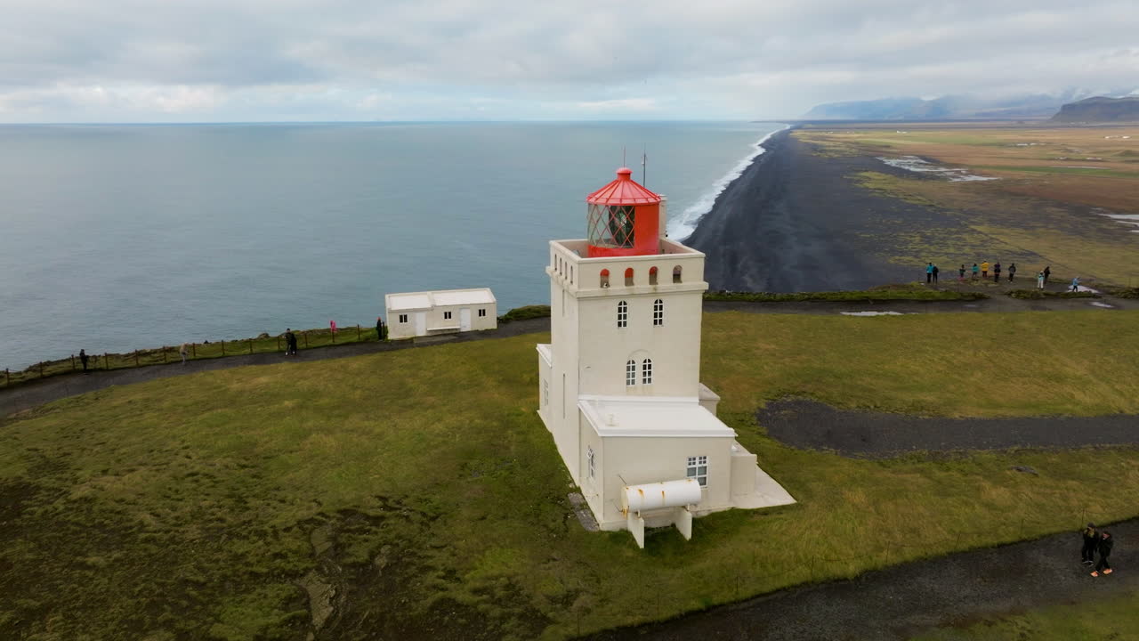 Aerial View Of Dyrh&oacute;laey Lighthouse In Iceland - Drone Shot