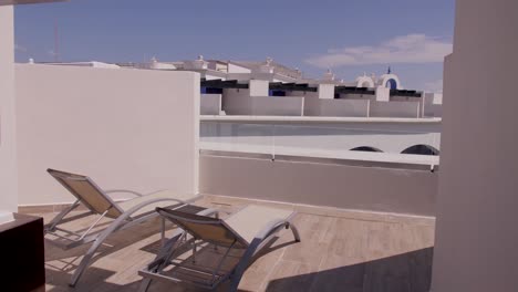 a rooftop balcony of a suite at a fancy mexican resort