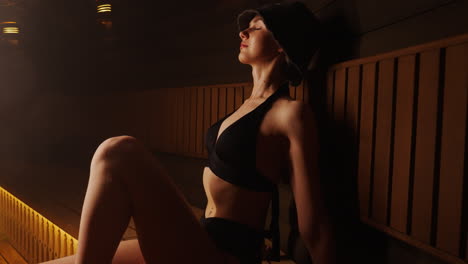 woman relaxing in a sauna