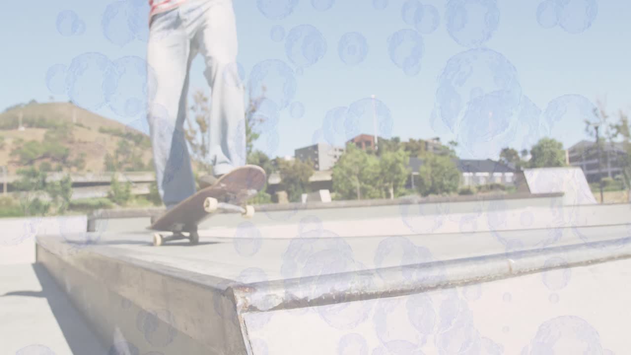 animación de burbujas sobre hombre caucásico patinando