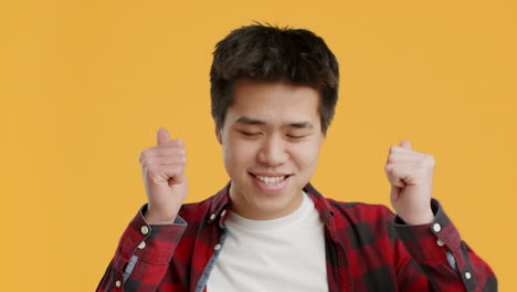 happy young man showing emotion