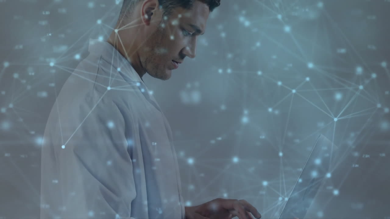 Animation of network of connections over caucasian male doctor using laptop