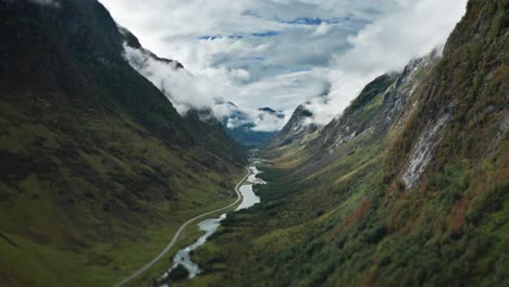 an aerial view of the narrow valley between the mountains