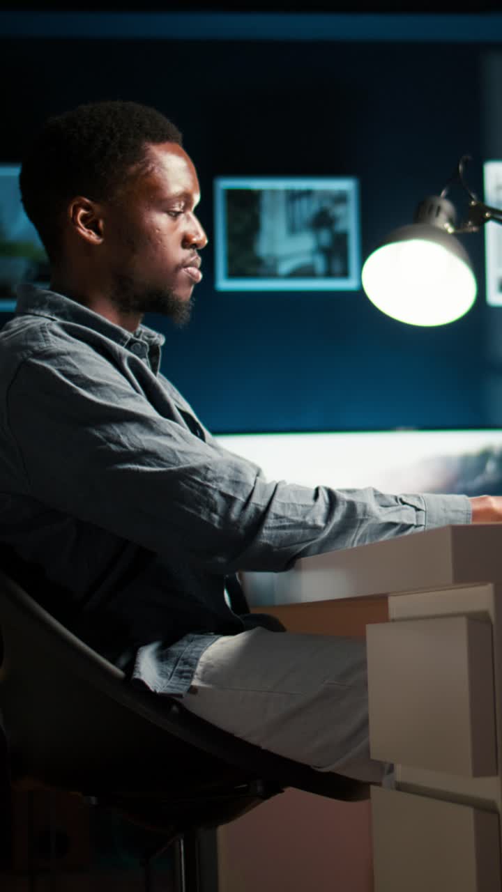 Stressed man working at desk