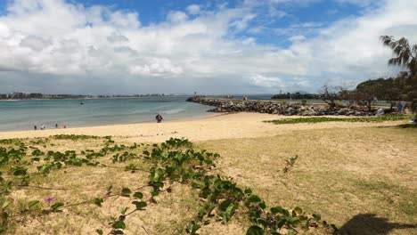 The-Spit-beach,-Mooloolaba,-looking-towards-the-Spit-Rock-Wall,-Sunshine-Coast,-Queensland,-Australia