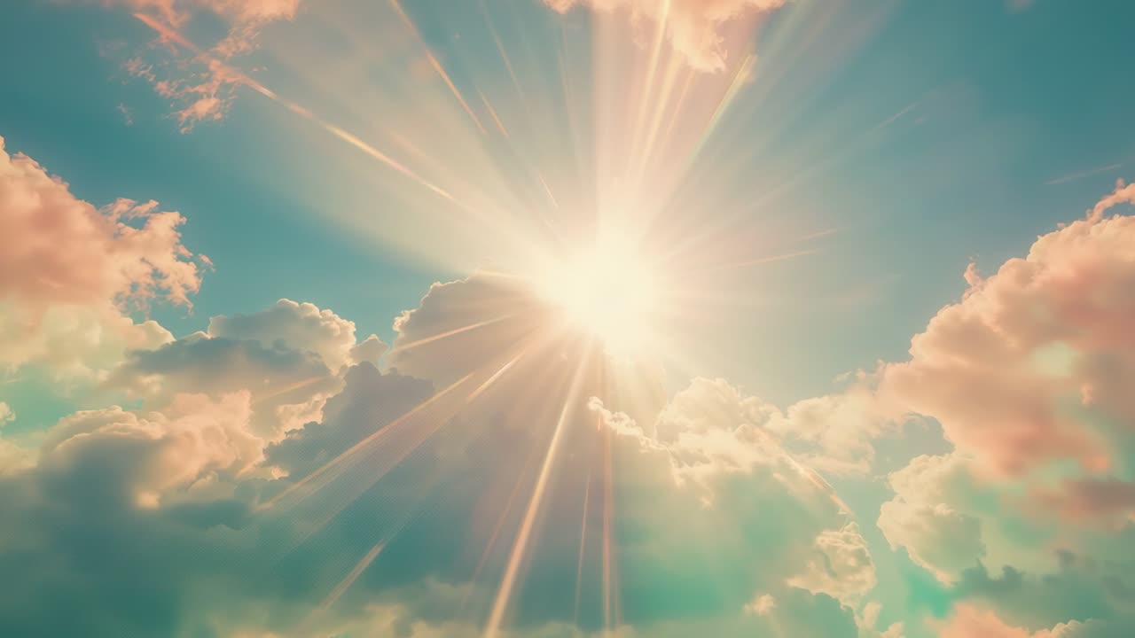 Brightening sun emerging from mid cumulus bank in sky emitting beams and lensflare lighting clouds