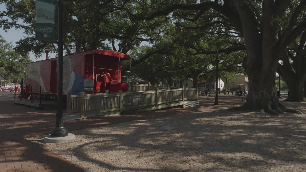 A 4K low-level drone walkthrough of League Park featuring views of the fountain, caboose and visitor center in League City, Texas.