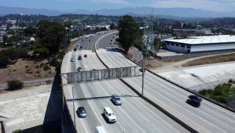 Close-up-drone-shot-cars-driving-interstate-highway-system-in-America