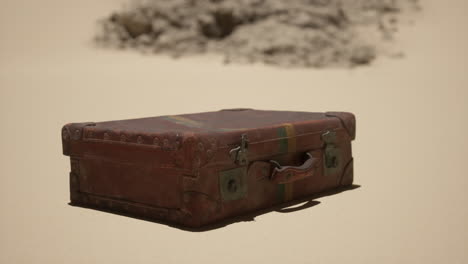 vintage suitcase in the desert