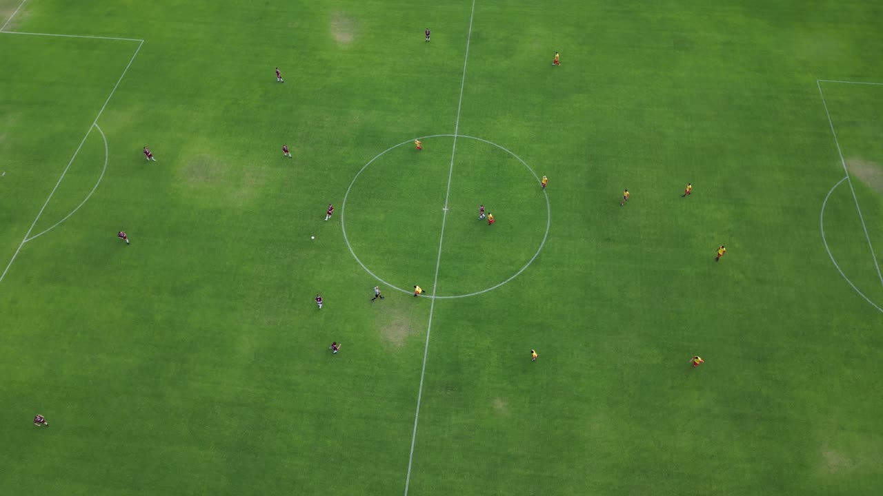 Initial kick for start of amateur soccer football match in Australia