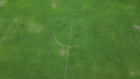 initial kick for start of amateur soccer football match in australia