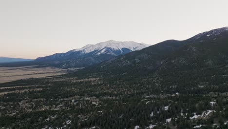 Drone-approaching-Mount-Princeton-in-the-Rocky-Mountains-in-Colorado-over-pine-trees