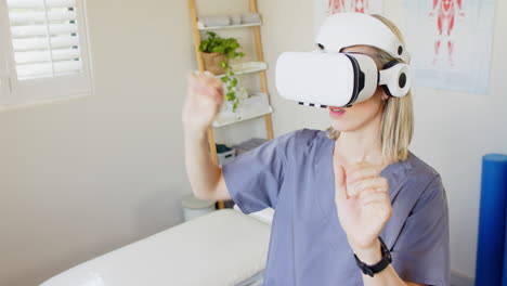 using vr headset, woman in scrubs exploring virtual environment in medical clinic, copy space