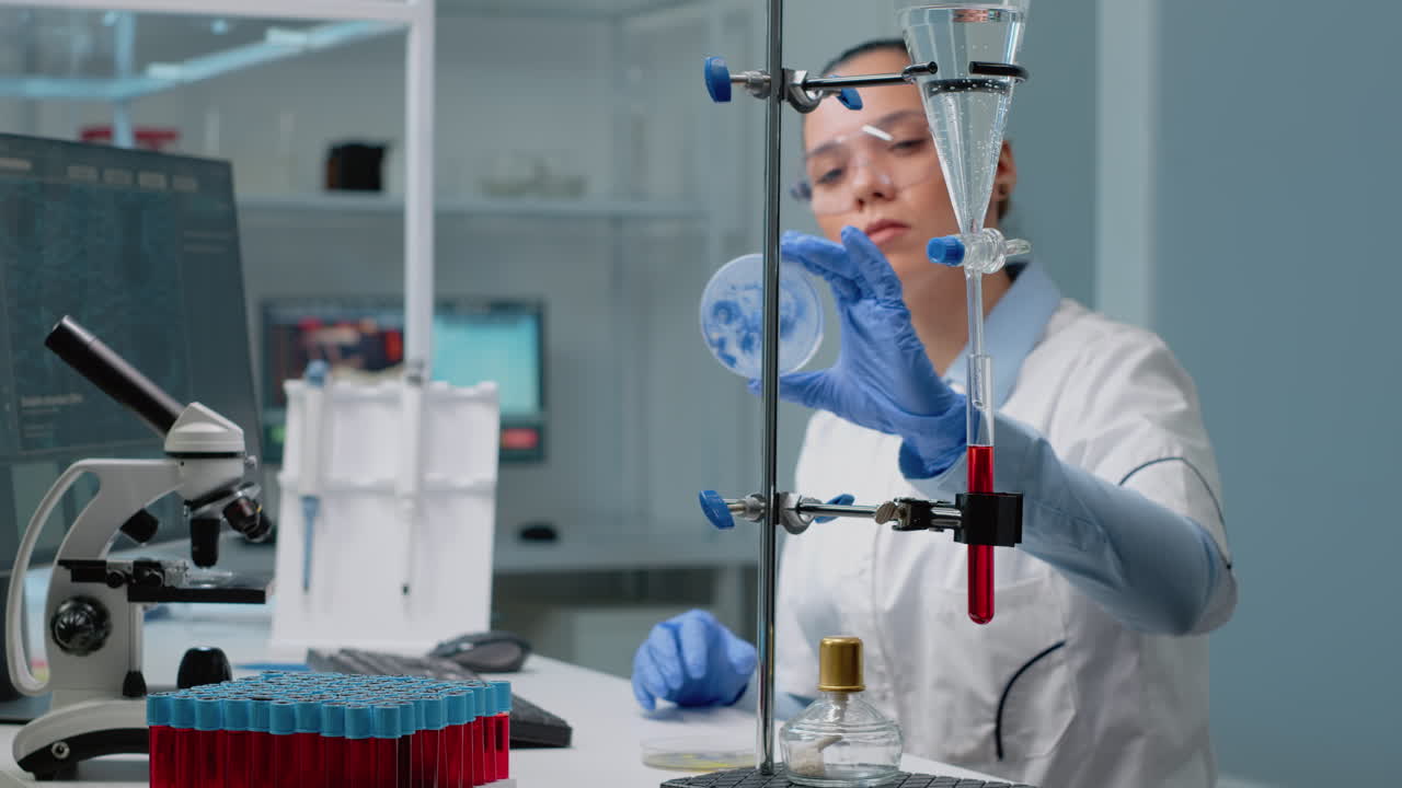 Scientist in Laboratory Conducting Experiment