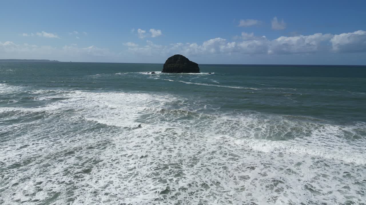 Scenic Coastal View with Rock Formation in the Sea