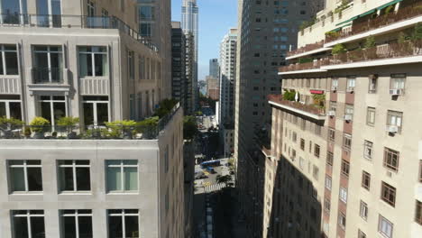 aerial tracking shot of traffic on the west 62th street of sunny lincoln square, ny