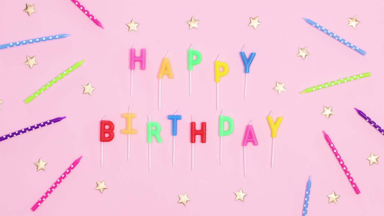 Birthday party candles with Happy birthday text move on pastel pink theme. Stop motion