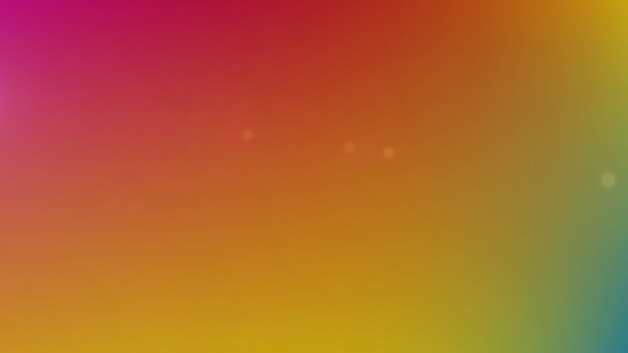 animación de manchas de luz blanca que se mueven sobre un fondo naranja.