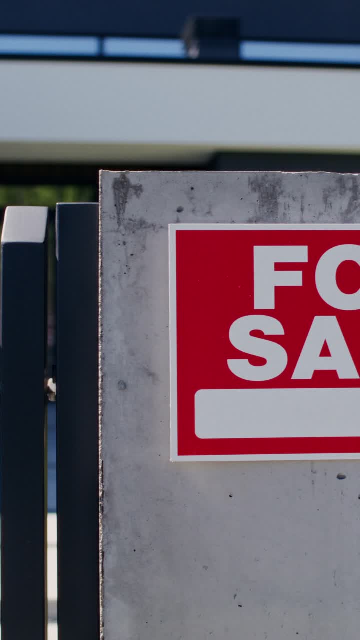 For Sale Sign on Concrete Wall