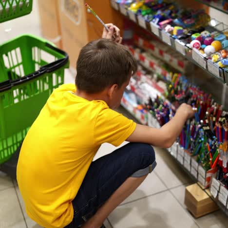 boy with school stationery