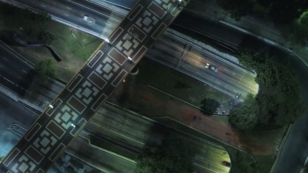 Aerial view of Santa Efigenia viaduct at night with no one in the street, at night, Sao Paulo downtown, Brazil