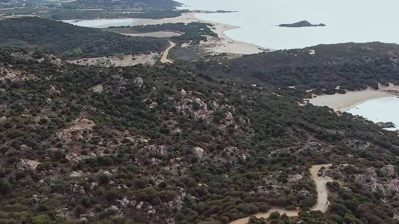 Views of Sardinia's coast and landscape from above during the day