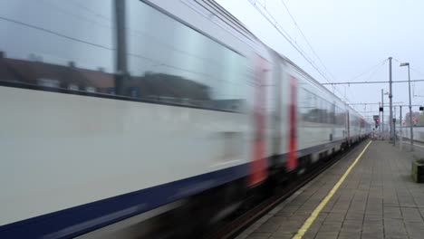 belgium train passing railway station