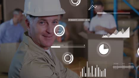 animation of graphs, loading bars and circles over caucasian man keeping cardboard box on table