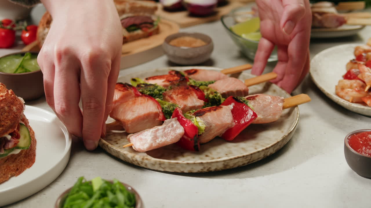 Salmon and Vegetable Skewers on a Buffet Table