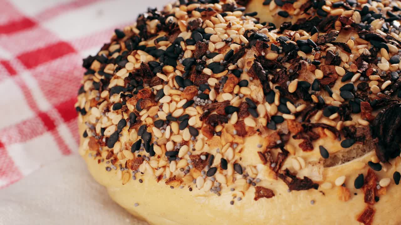 Bagel sandwich brunch, lunch plate of a bagel with smoked salmon and cream cheese and ham, close up morning cafe menu.