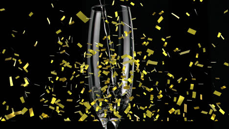 Animation-of-gold-confetti-falling-over-chmpagne-glass-on-black-background