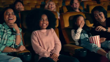 people audience watching movie in cinema theater.