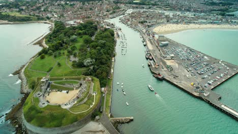 Weymouth's-Historic-Nothe-Fort-And-Harbor-In-Dorset,-UK---aerial-drone-shot