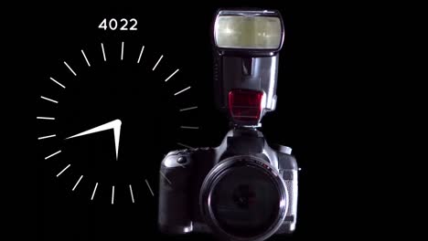 animation of camera and moving clock on black background