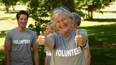 Team-of-happy-volunteers-in-the-park