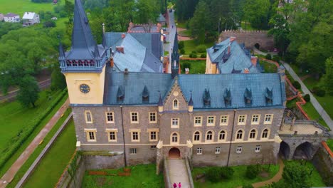 aerial view of zruc nad sazavou chateau with woods surrounding estate