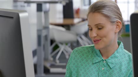 young woman working in a creative office