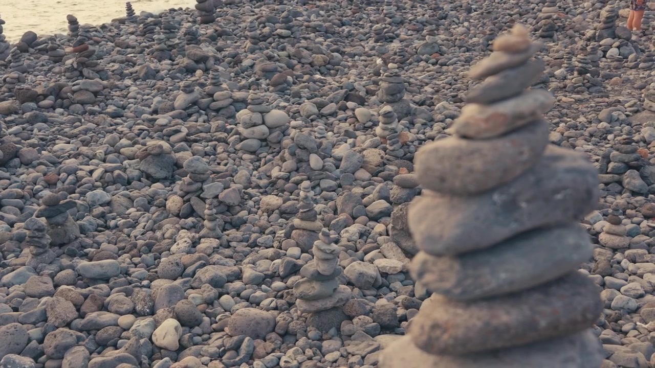 Cinematic drone footage of Teide National Park featuring volcanic landscapes, lava fields, rugged mountain scenery, and breathtaking aerial views of Tenerife.